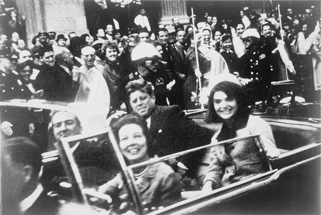 Jackie and John F Kennedy in the limousine, ride through Dallas. 1963