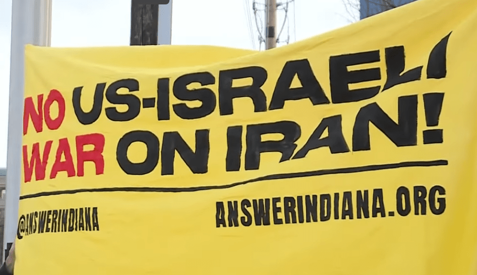 Sign: No US-Israeli War on Iran