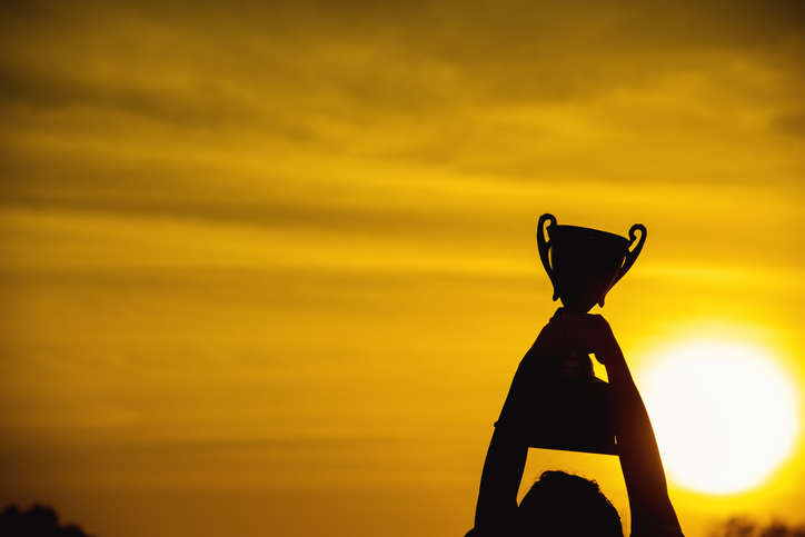 Sport Silhouette trophy best man Winner Award victory trophy for professional challenge. Golden Trophy cup champion contest win sport award reward gold prize. Win-Win business conquering Challenge