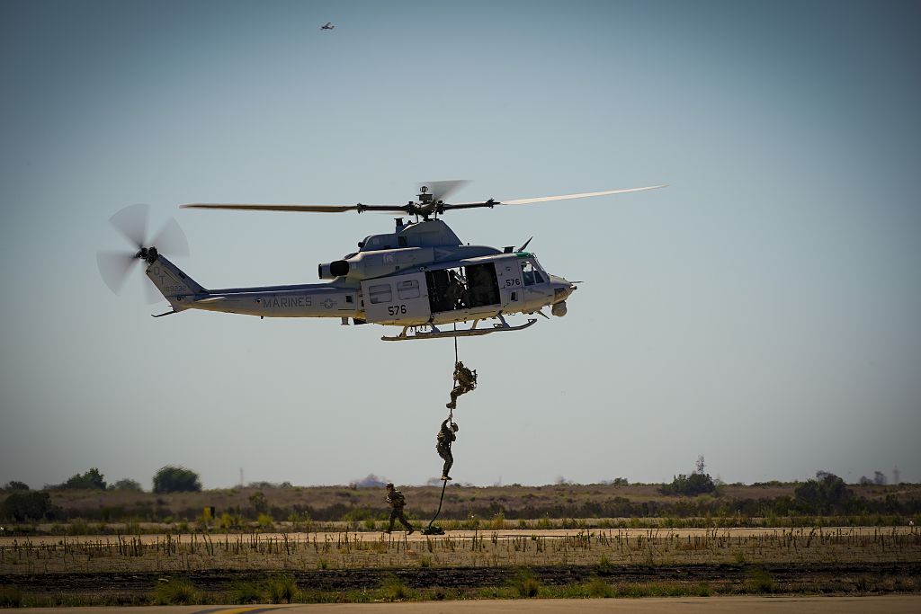 "San Diego, CA - September 22: At MCAS Miramar on Thursday, Sept. 22, 2022 in San Diego, CA., the Marine Air-Ground Task Force (MAGTF) rehearse with infantry Marines fast roping onto an objective. This MAGTF operation will be included for the annual MCA