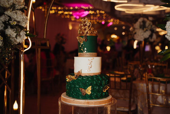 green and white cake at an event