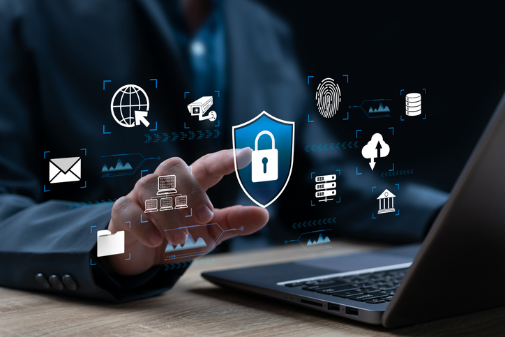 Cybersecurity and Data Encryption Concept, Businessman Securing Online Systems with Advanced Protection, Cloud Privacy Management, Network Security, Digital Data Protection Against Cyber Threats