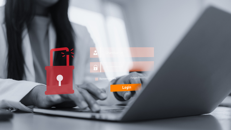 cybersecurity breach and data hacker attack on laptop screen.identity theft and password scam concept in black and white.business woman hand typing on computer with security threat alert.