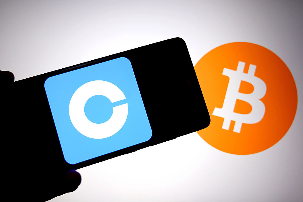 In this photo illustration, a Coinbase logo is seen