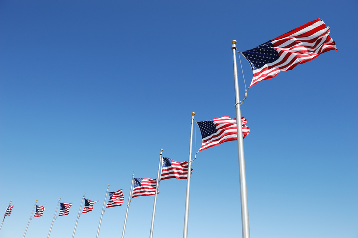 USA flags in a circle waving in the wind