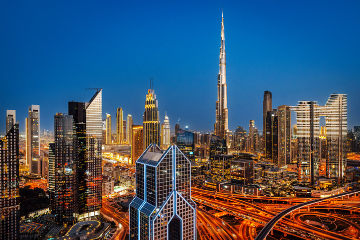 Dubai Night Skyline With Burj Khalifa And Highways