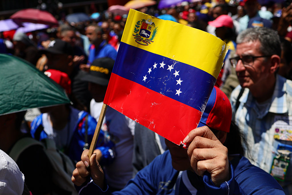 Pro-government Supporters March To Demand The Lifting Of Sanctions