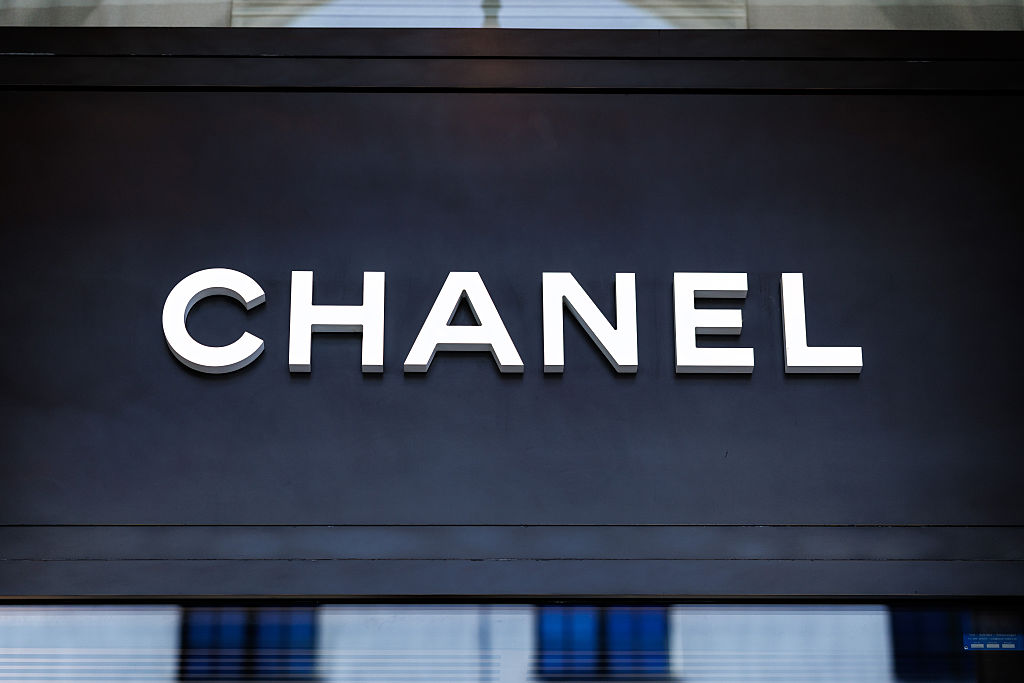 Chanel brand logo on a store of the luxury brand
