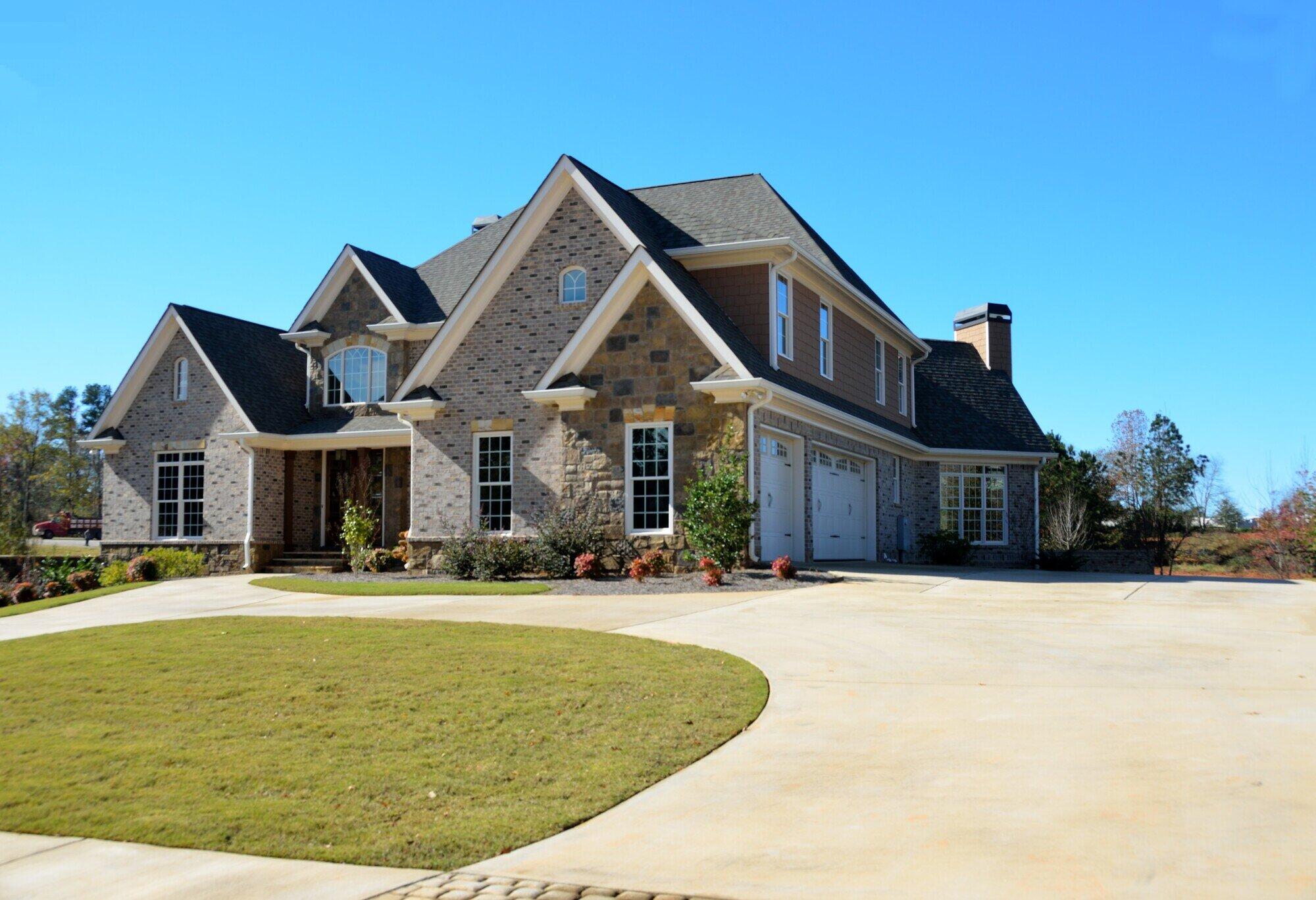 Concrete resurfacing adds years to your garage and driveway