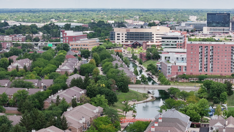 Townhouse Canal Neighborhood With Commercial Buildings Beyond, Indianapolis, Indiana