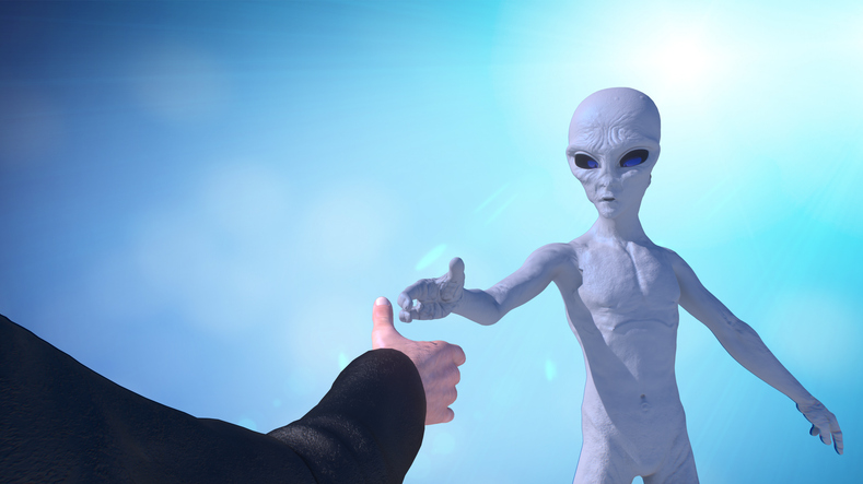 3D render of human hand reaching to shake hands with gray alien first contact concept
