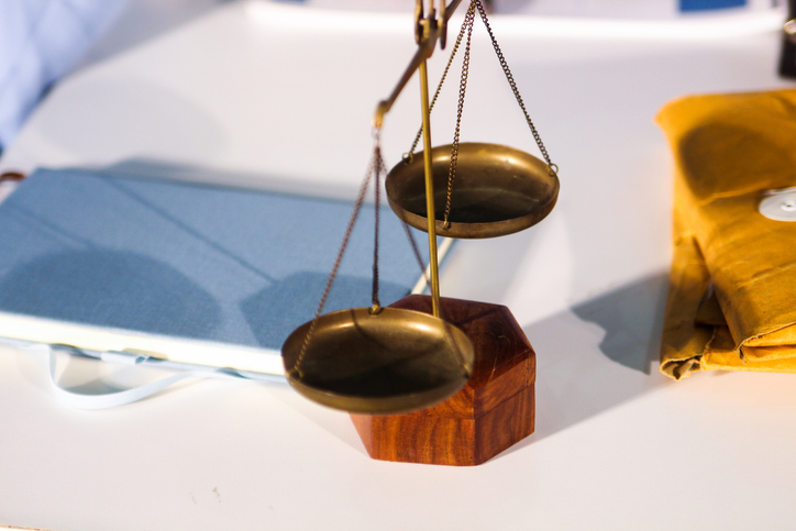 Consultation and conference of professional businesswoman and Male lawyers working and discussion having at law firm in office. Concepts of law, Judge gavel with scales of justice