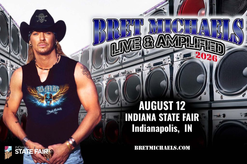 A man in a cowboy hat and tank top stands in front of a large speaker setup advertising a "Bret Michaels Live & Amplified 2026" concert at the Indiana State Fair on August 12.