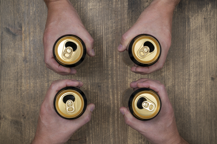 Top view group of friends holding beer cans