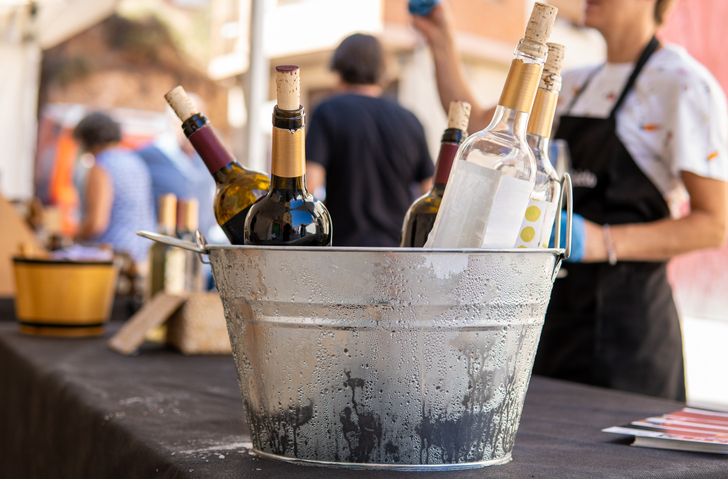 Wine bottles chilling in ice bucket