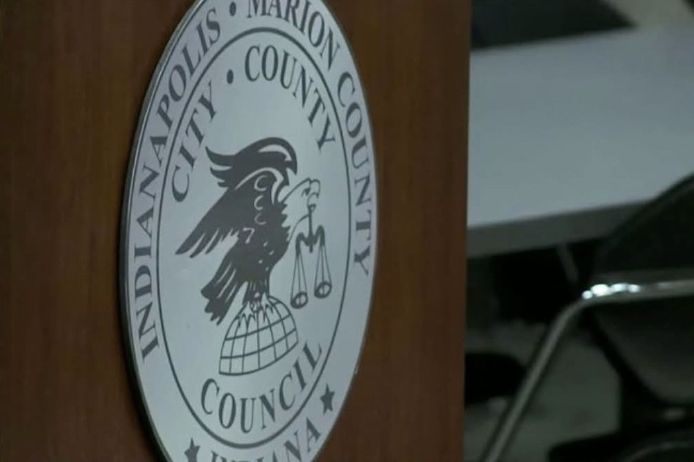 Indiana county council seal with eagle icon and text "Marion County Council