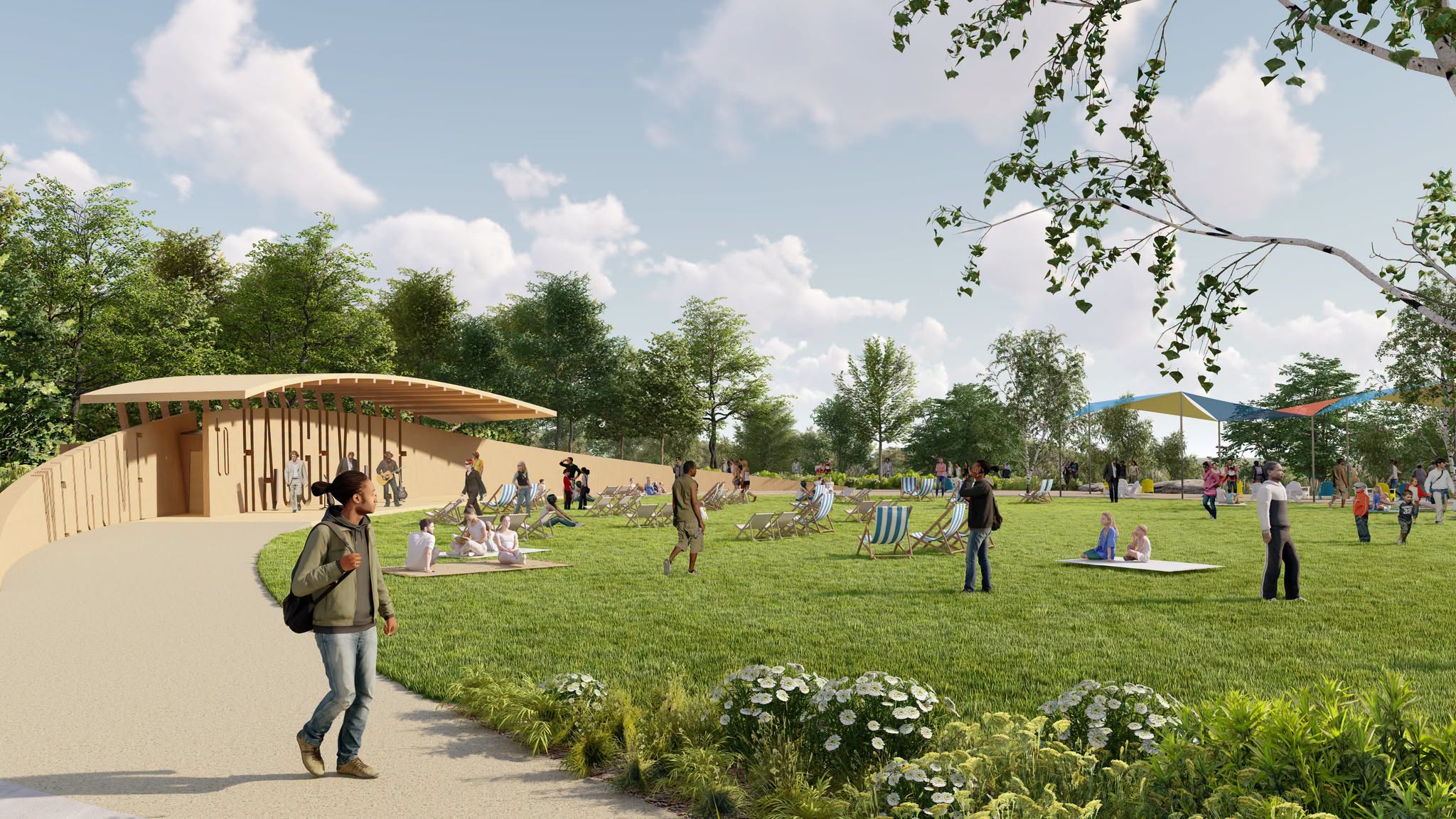 A park with people relaxing on the grass, walking, and enjoying the outdoors under a canopy of trees.