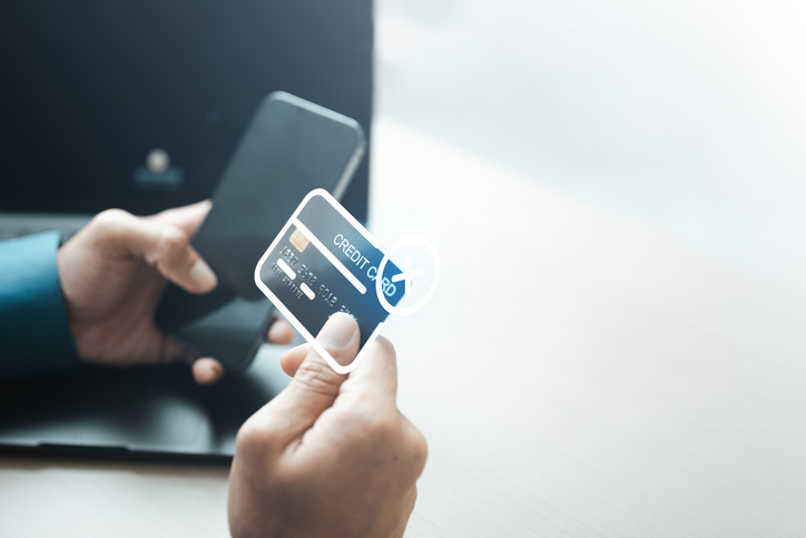 User freezes a credit card via mobile banking app to prevent unauthorized transactions. Concept of digital security, fraud protection, account control, and fintech safety.