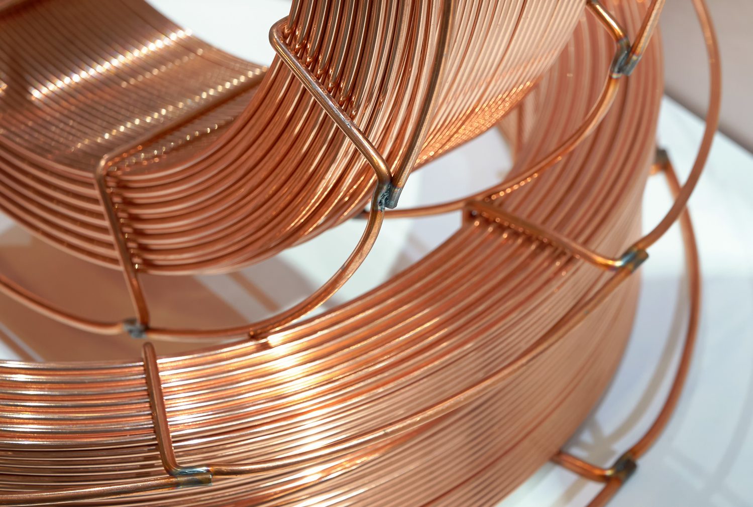 Large spools of copper welding wire. Used for automatic robotic welding in factories and workshops.
