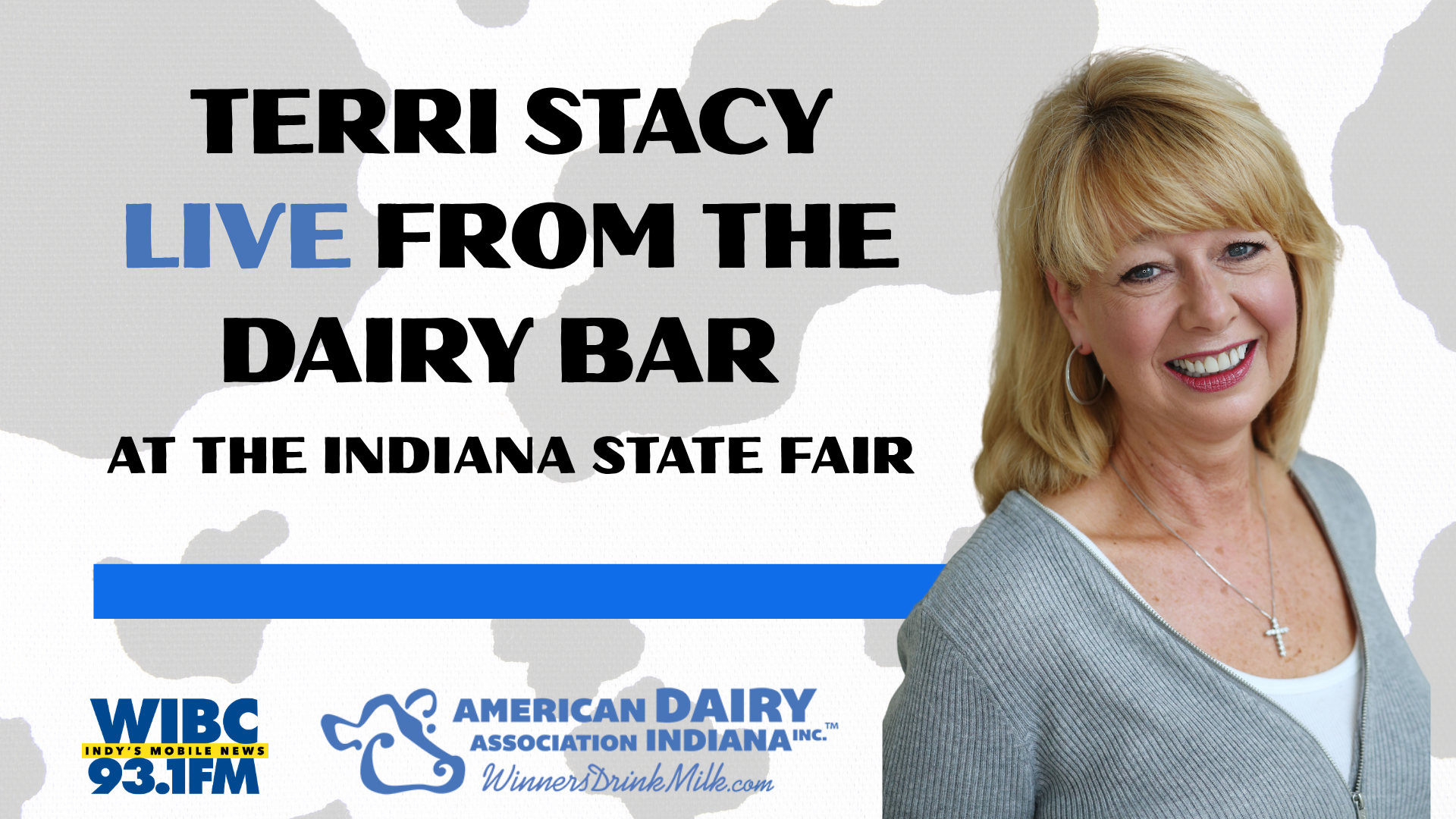 Terri Stacy smiling and standing in front of a sign for "Live from the Dairy Bar at the Indiana State Fair" with WIBC and American Dairy Association Indiana logos.