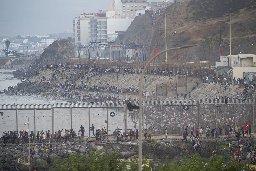 Hundreds of migrants reach Spain's Ceuta after swimming from Morocco