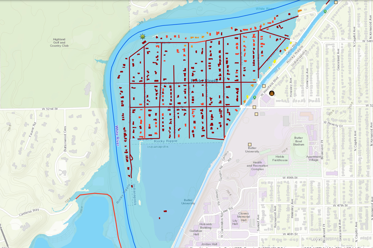 Map showing a grid of city blocks and streets near a large body of water, with numerous red dots indicating locations.