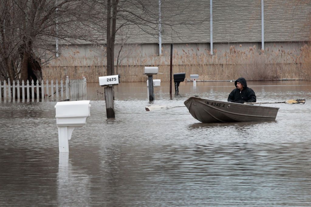 Rains And Snow Melt Lead To Major Flooding And Evacuations In Midwest