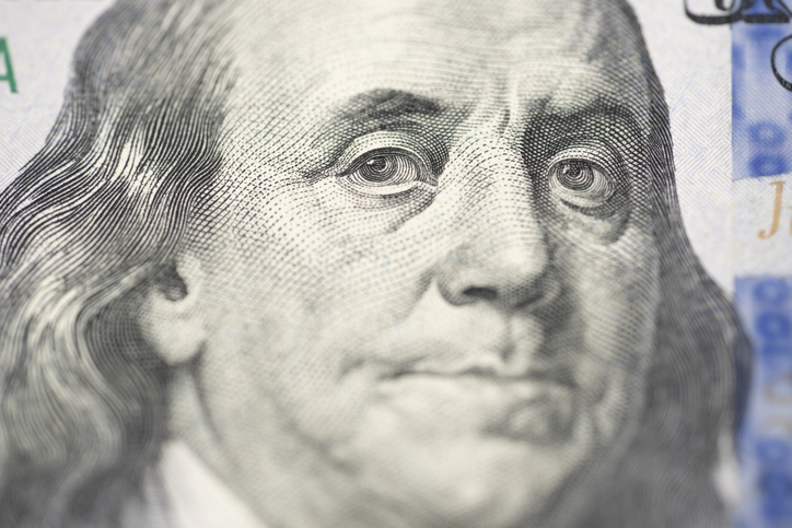 dollar bill macro Benjamin Franklin portrait. dollar closeup US currency banknote detail. dollar engraving texture security pattern design. dollar financial concept investment wealth economy.