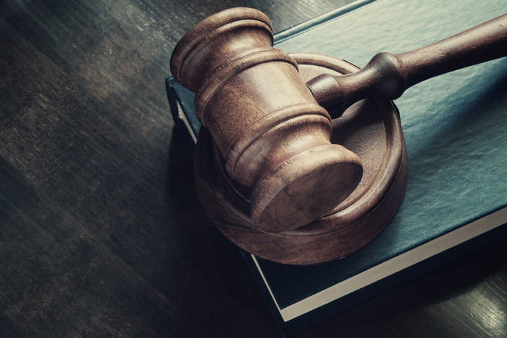 Gavel and legal book close up