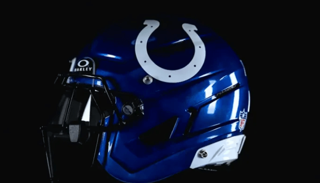 A blue football helmet with a white horseshoe logo on the side.