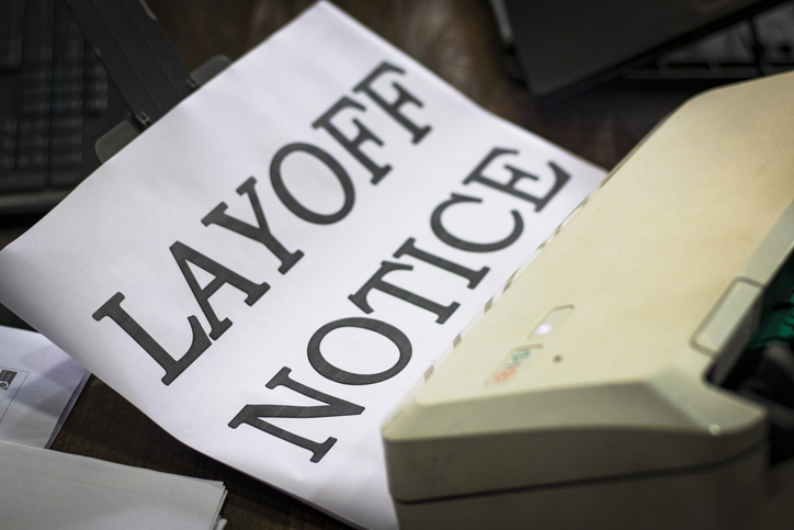 Printed Layoff Notice in Office.
