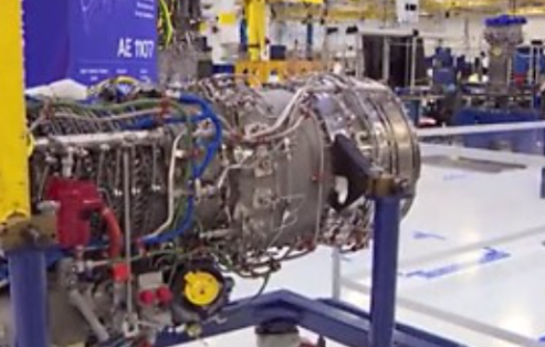 Detailed view of a jet engine, with various components and wiring visible.